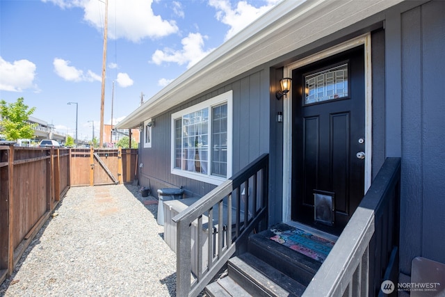 property entrance with a gate and fence