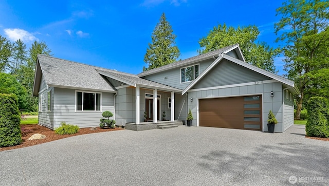 5010 NW Dr, Bellingham, WA 98226 - view of front of property featuring asphalt driveway, a garage, and roof with shingles