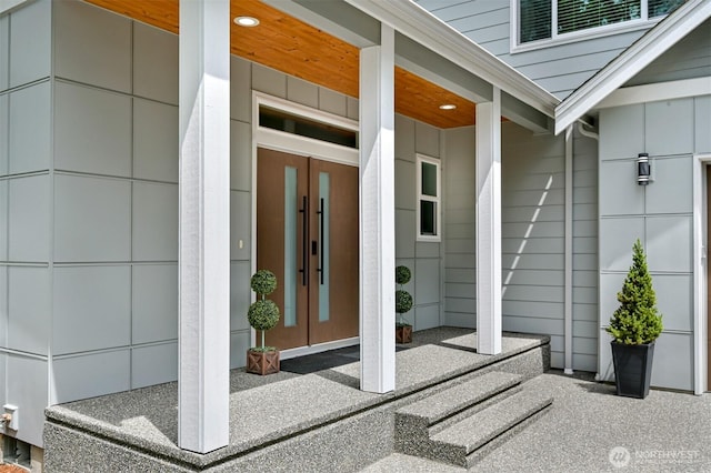 5010 NW Dr, Bellingham, WA 98226 - entrance to property with a porch, elevator, and board and batten siding
