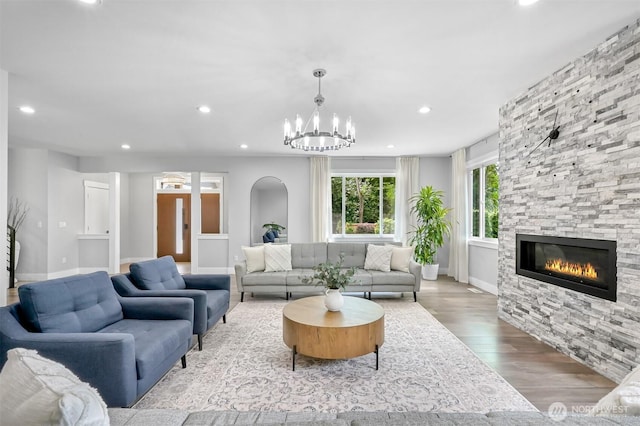 5010 NW Dr, Bellingham, WA 98226 - living room featuring wood finished floors, recessed lighting, a fireplace, a chandelier, and baseboards