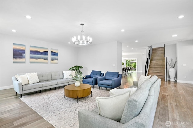 5010 NW Dr, Bellingham, WA 98226 - living room with a chandelier, stairs, recessed lighting, baseboards, and light wood-type flooring