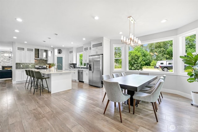 5010 NW Dr, Bellingham, WA 98226 - dining space with light wood finished floors, recessed lighting, and baseboards