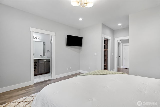 5010 NW Dr, Bellingham, WA 98226 - bedroom with wood finished floors, baseboards, connected bathroom, and recessed lighting