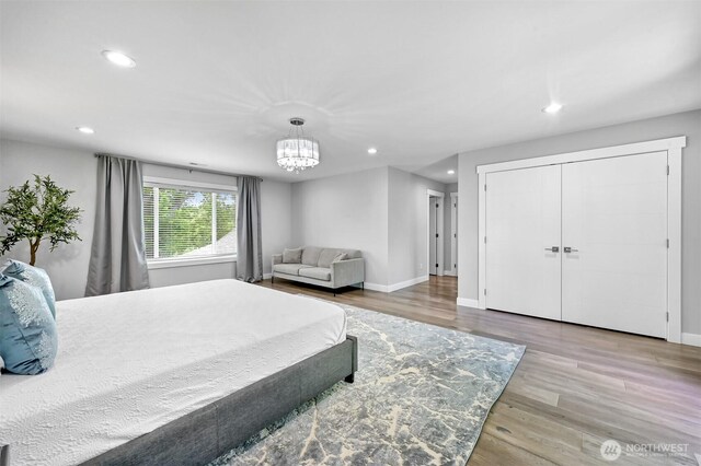 5010 NW Dr, Bellingham, WA 98226 - bedroom with recessed lighting, wood finished floors, a chandelier, and baseboards
