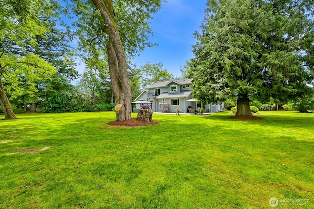 5010 NW Dr, Bellingham, WA 98226 - view of grassy yard featuring a patio