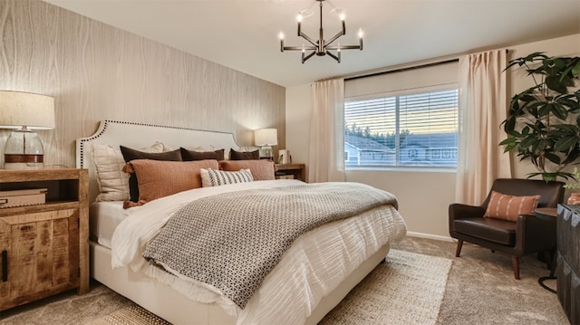 bedroom with baseboards, a notable chandelier, and light carpet