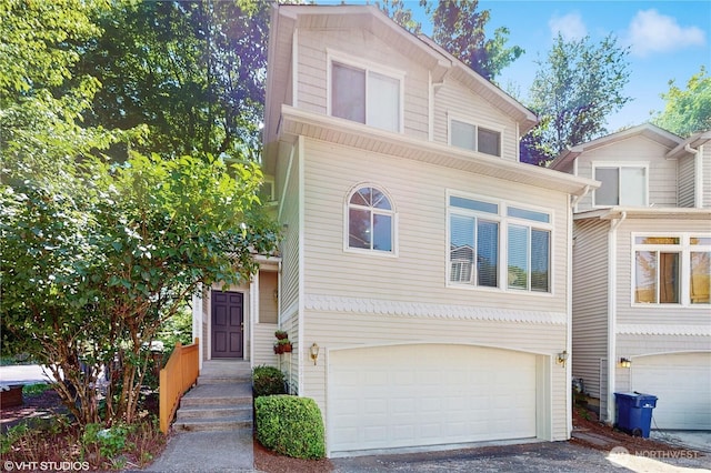 12331 NE 101st Ln, Kirkland, WA 98033 - traditional home with a garage and driveway