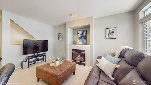 12331 NE 101st Ln, Kirkland, WA 98033 - living area with carpet, a tile fireplace, and baseboards