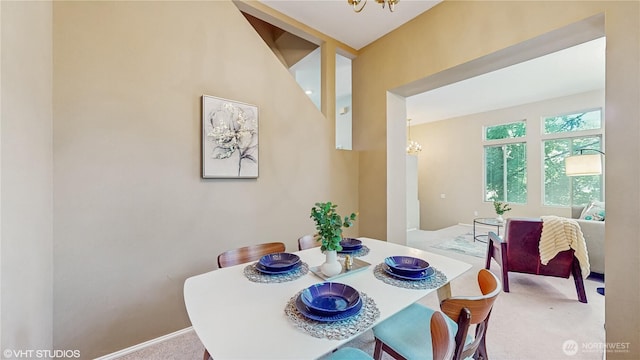 12331 NE 101st Ln, Kirkland, WA 98033 - carpeted dining space with a chandelier