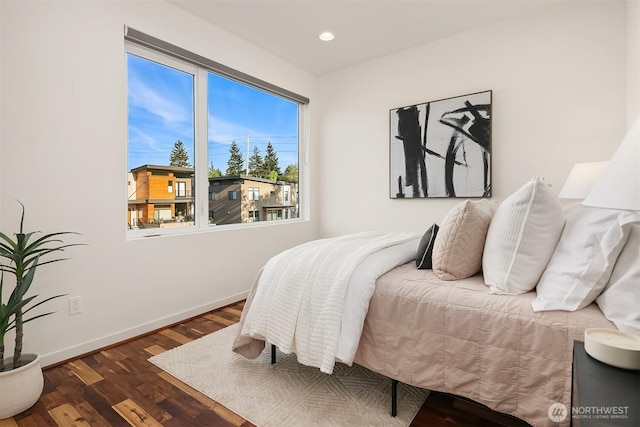 bedroom featuring recessed lighting, baseboards, and wood finished floors