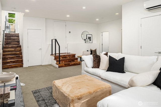 carpeted living room with stairs, recessed lighting, and a wall mounted AC