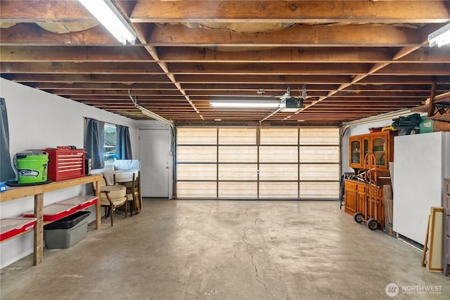 garage featuring a garage door opener