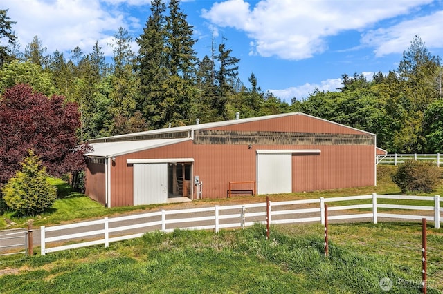 25443 Pioneer Way NW, Poulsbo, WA 98370 - rear view of property featuring an outbuilding and an outdoor structure