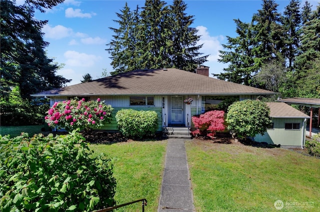 2734 Sunset Dr W, University Place, WA 98466 - view of front facade featuring a chimney and a front yard