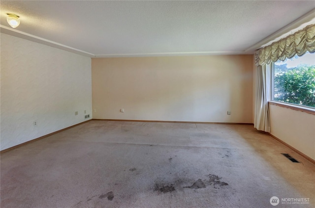 2734 Sunset Dr W, University Place, WA 98466 - carpeted spare room featuring a textured ceiling, baseboards, and visible vents