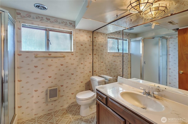 2734 Sunset Dr W, University Place, WA 98466 - full bath featuring heating unit, toilet, wallpapered walls, a shower stall, and vanity