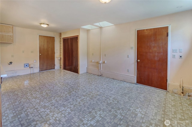 2734 Sunset Dr W, University Place, WA 98466 - unfurnished room featuring a skylight