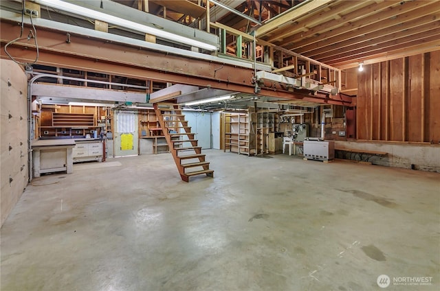 2734 Sunset Dr W, University Place, WA 98466 - below grade area featuring a workshop area and stairs