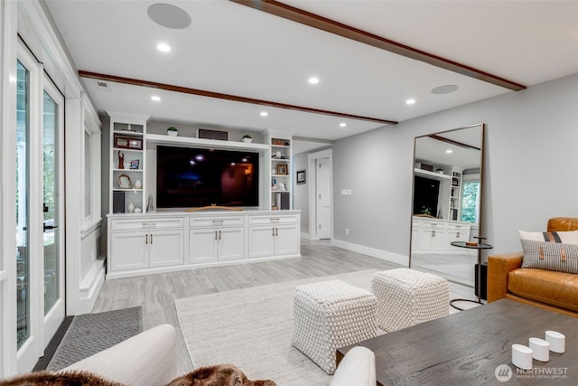 living area with light wood-style flooring, recessed lighting, and baseboards