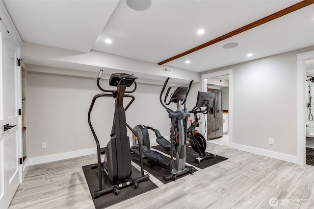 workout area with light wood-style flooring, recessed lighting, and baseboards