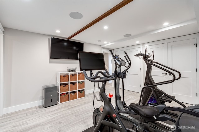 exercise room with light wood-style flooring, recessed lighting, and baseboards