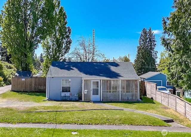 1902 S 17th St, Tacoma, WA 98405 - view of front of home featuring a sunroom and a garage