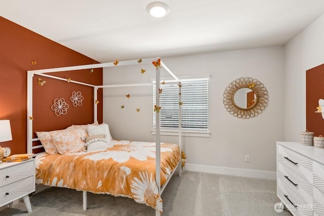 carpeted bedroom with baseboards