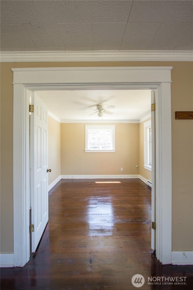 618 Coolidge Rd, Aberdeen, WA 98520 - unfurnished room with wood finished floors, crown molding, and ceiling fan