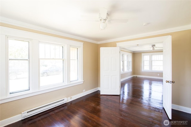 618 Coolidge Rd, Aberdeen, WA 98520 - empty room with a baseboard radiator, a ceiling fan, hardwood / wood-style flooring, and crown molding