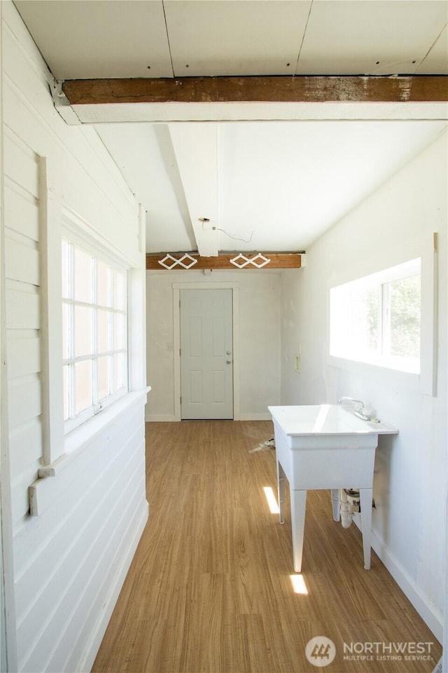 618 Coolidge Rd, Aberdeen, WA 98520 - corridor with light wood-type flooring and beam ceiling