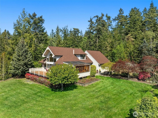 565 Olympic View Ln, Camano Island, WA 98282 - rear view of property with a lawn, a view of trees, and a deck