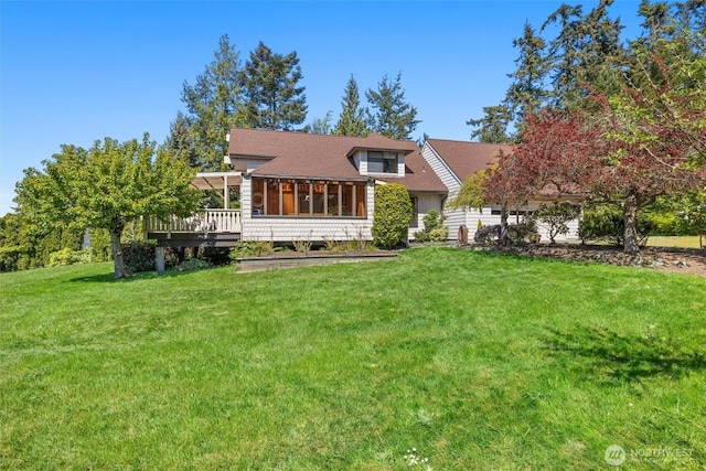 565 Olympic View Ln, Camano Island, WA 98282 - back of house featuring a yard and a sunroom