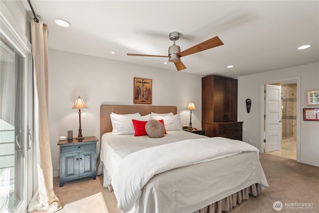 bedroom with light colored carpet, ensuite bathroom, ceiling fan, and recessed lighting