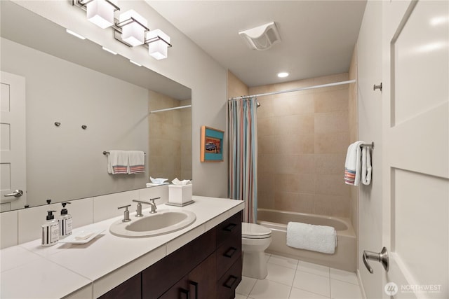 full bathroom with vanity, shower / bath combo, toilet, and tile patterned floors
