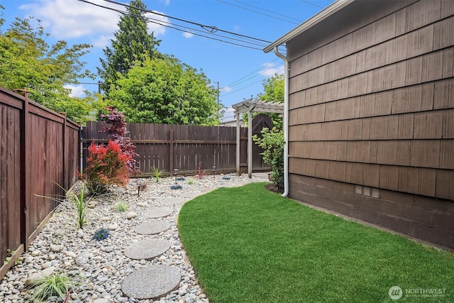 view of yard with a pergola