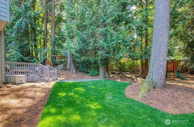 view of yard featuring a deck