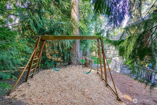 view of playground with fence