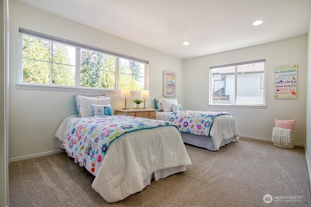 bedroom featuring multiple windows, carpet floors, baseboards, and recessed lighting