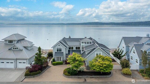 view of subject property featuring a nearby body of water