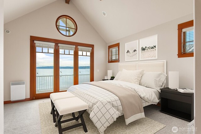bedroom with access to outside, light carpet, high vaulted ceiling, a water view, and beamed ceiling