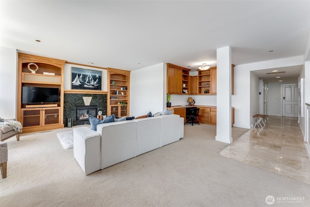 2015 SE Columbia River Dr Unit 320, Vancouver, WA 98661 - living room with light carpet, baseboards, and a premium fireplace