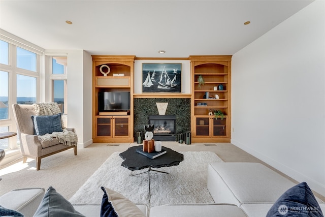 2015 SE Columbia River Dr Unit 320, Vancouver, WA 98661 - living room with carpet flooring, baseboards, and a fireplace