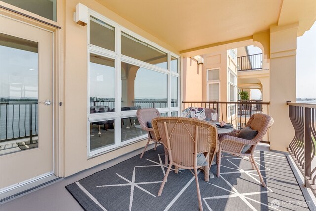 2015 SE Columbia River Dr Unit 320, Vancouver, WA 98661 - balcony featuring outdoor dining area and a water view