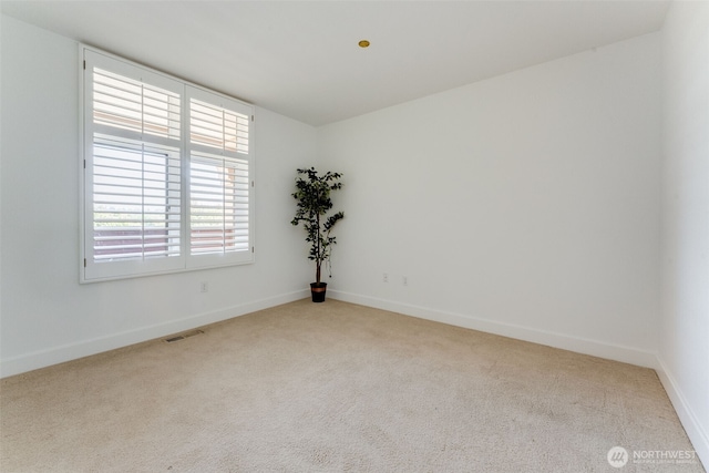 2015 SE Columbia River Dr Unit 320, Vancouver, WA 98661 - empty room with carpet floors, baseboards, and visible vents