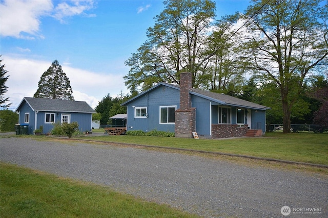 20005 Carper Rd SW, Rochester, WA 98579 - view of front of property with a chimney and a front yard