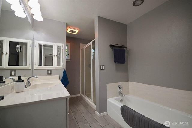 20005 Carper Rd SW, Rochester, WA 98579 - full bath featuring a shower stall, a garden tub, baseboards, and vanity