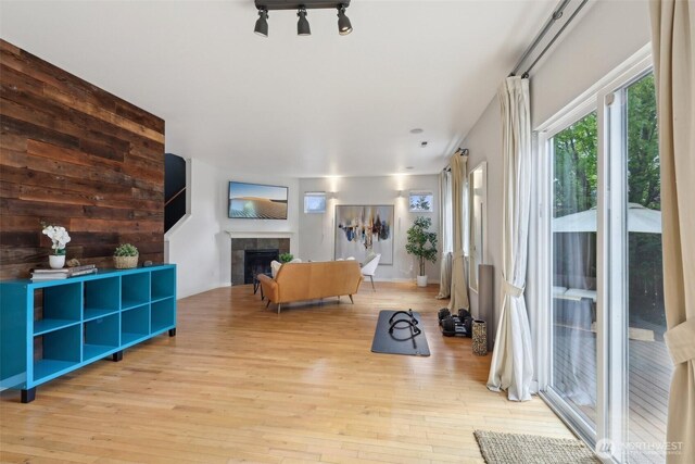 27859 256th Ct SE, Maple Valley, WA 98038 - living room with wood-type flooring and a tile fireplace