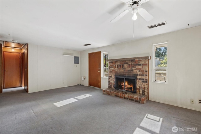 22907 60th Ave W, Mountlake Terrace, WA 98043 - unfurnished living room featuring a fireplace, carpet, and a ceiling fan