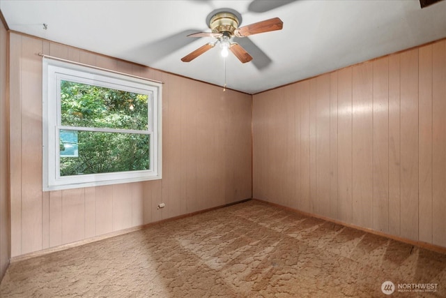 22907 60th Ave W, Mountlake Terrace, WA 98043 - unfurnished room featuring carpet flooring, a ceiling fan, and wood walls