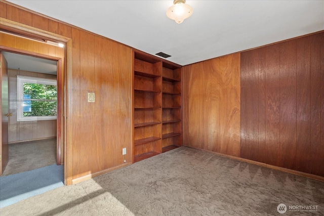22907 60th Ave W, Mountlake Terrace, WA 98043 - unfurnished room with carpet, wood walls, and built in features